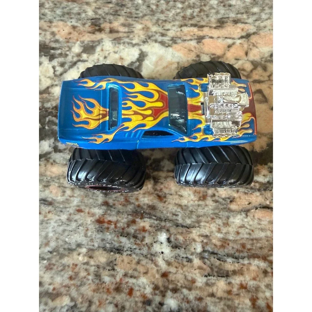 Hot Wheels Monster Jam Trucks Rodger Dodge - Blue w/ Red Rims  1:64 Scale
